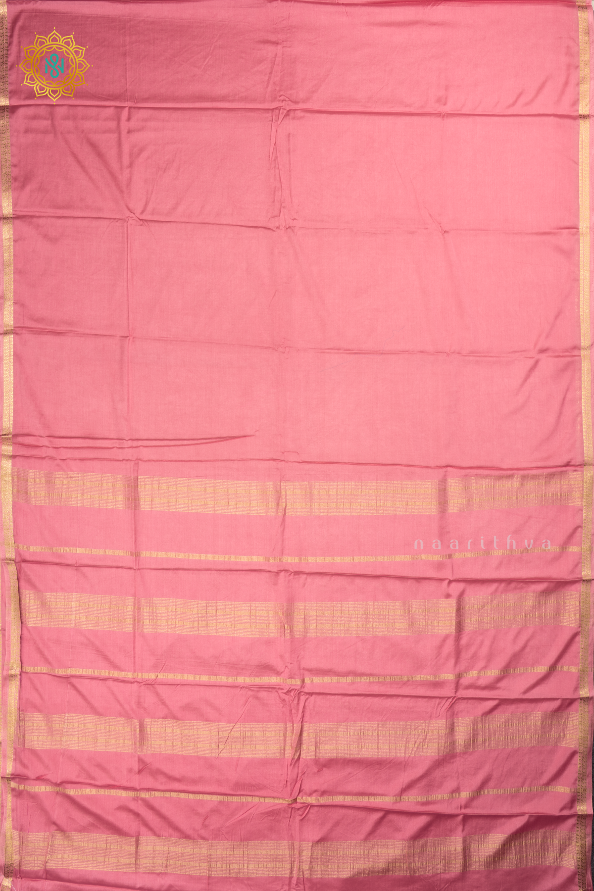 Peachish Pink Semi Mysore Crepe Silk with Plain Body and Zari Border