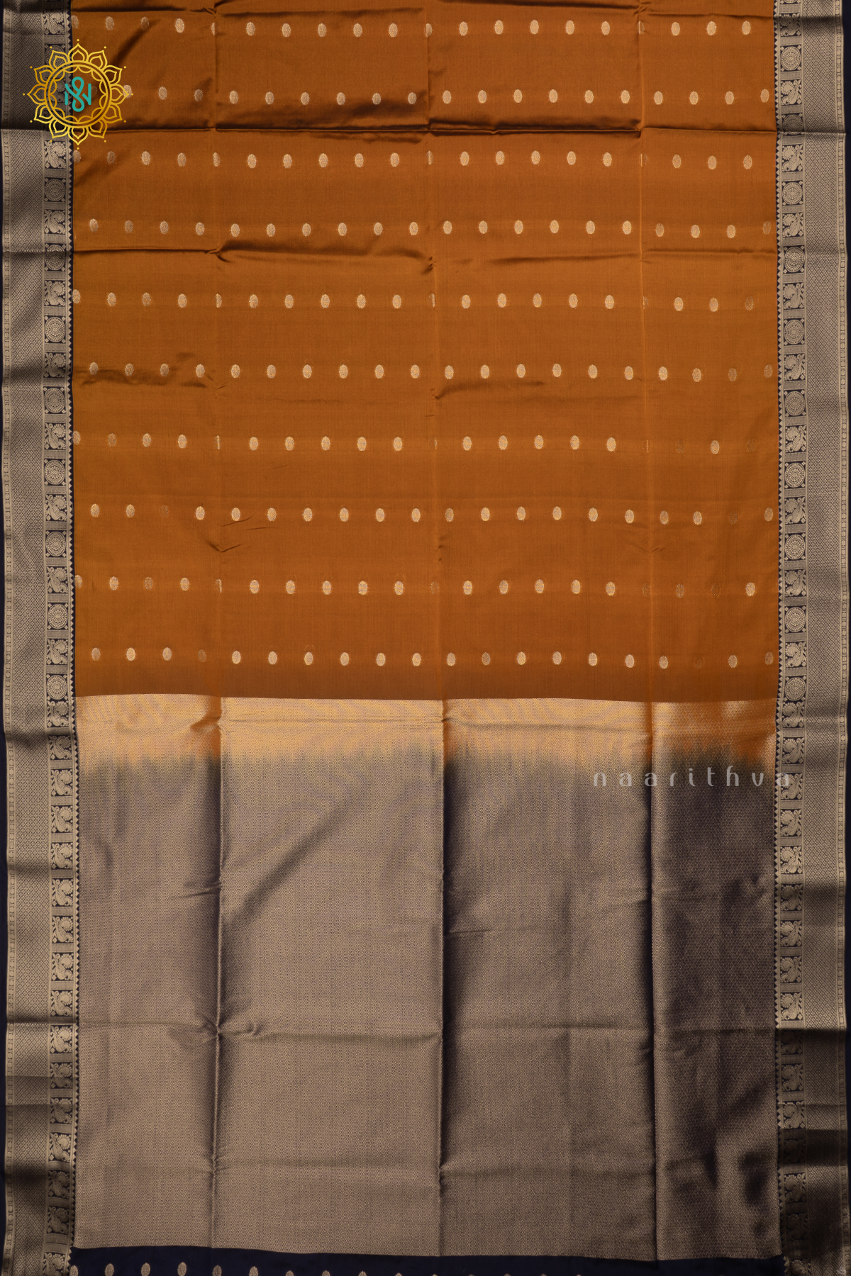Rust Orange With Navy Blue Semi Soft Silk Saree Allover Zari Buttas And Contrast Zari Border