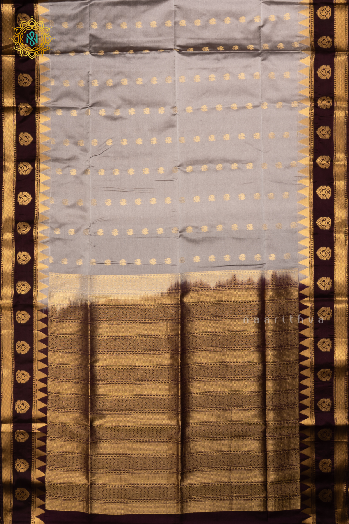 GREY WITH DEEP WINE - SEMI SOFT SILK SAREE ALLOVER ZARI BUTTAS AND CONTRAST TEMPLE RISING GAP BORDER