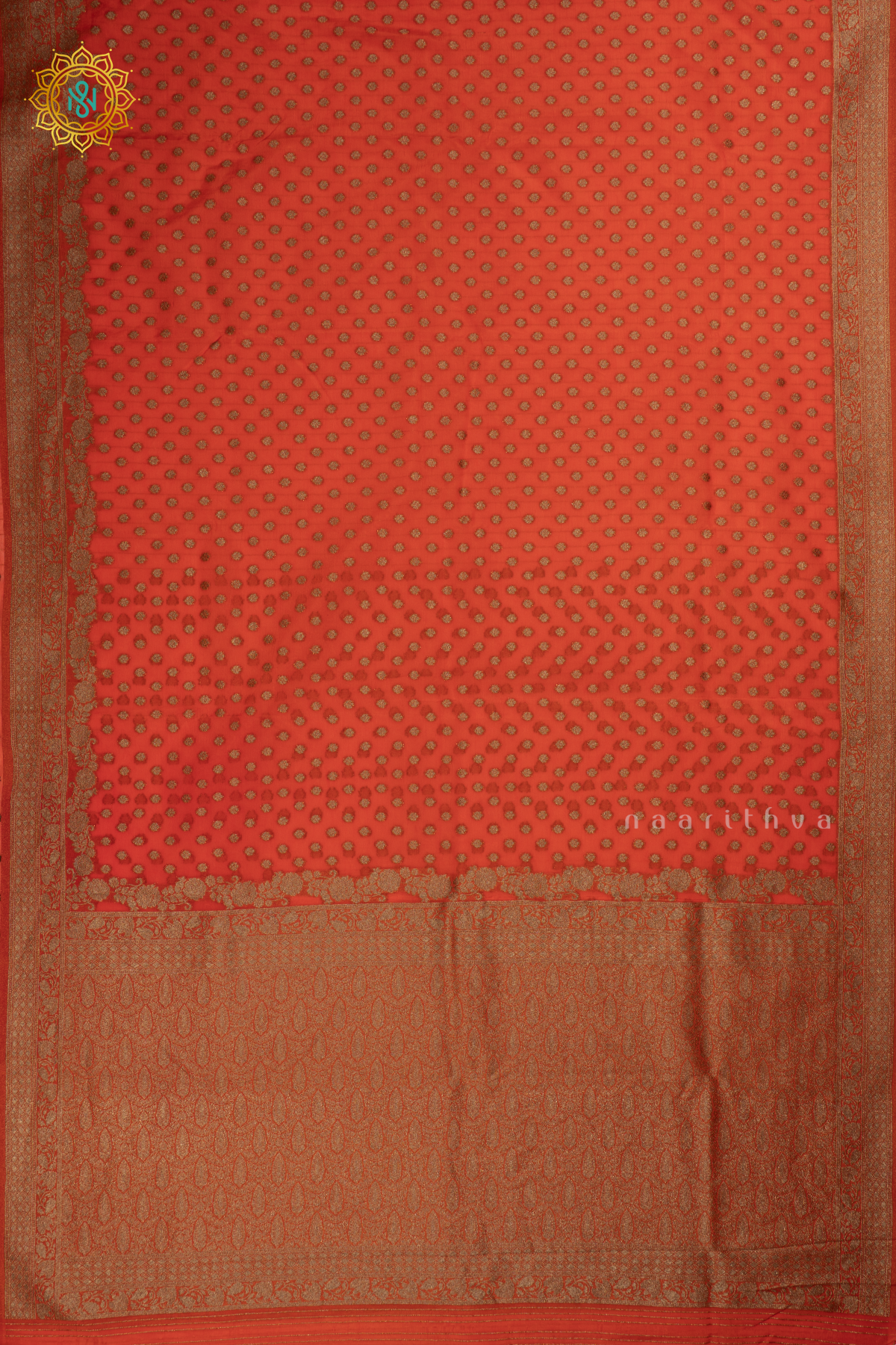 Orange - Semi georgette saree with allover zari buttas and zari border
