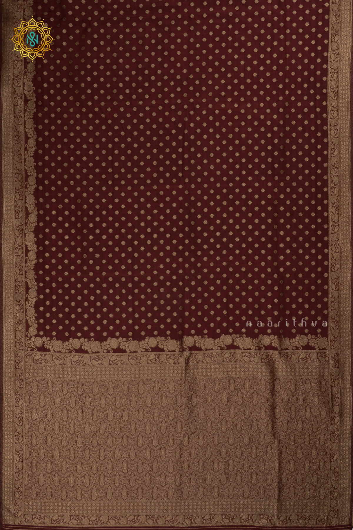 Brown - Semi georgette saree with allover zari buttas and zari border