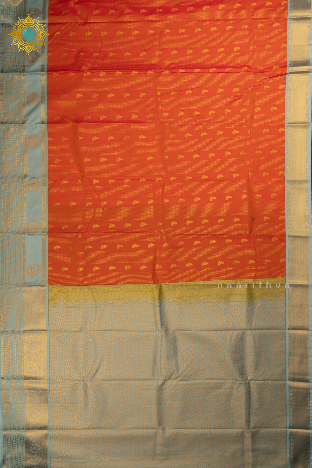 Orange With Aqua Green Semi Kanchi Saree With Zari Buttas All Over And Contrast Zari Border