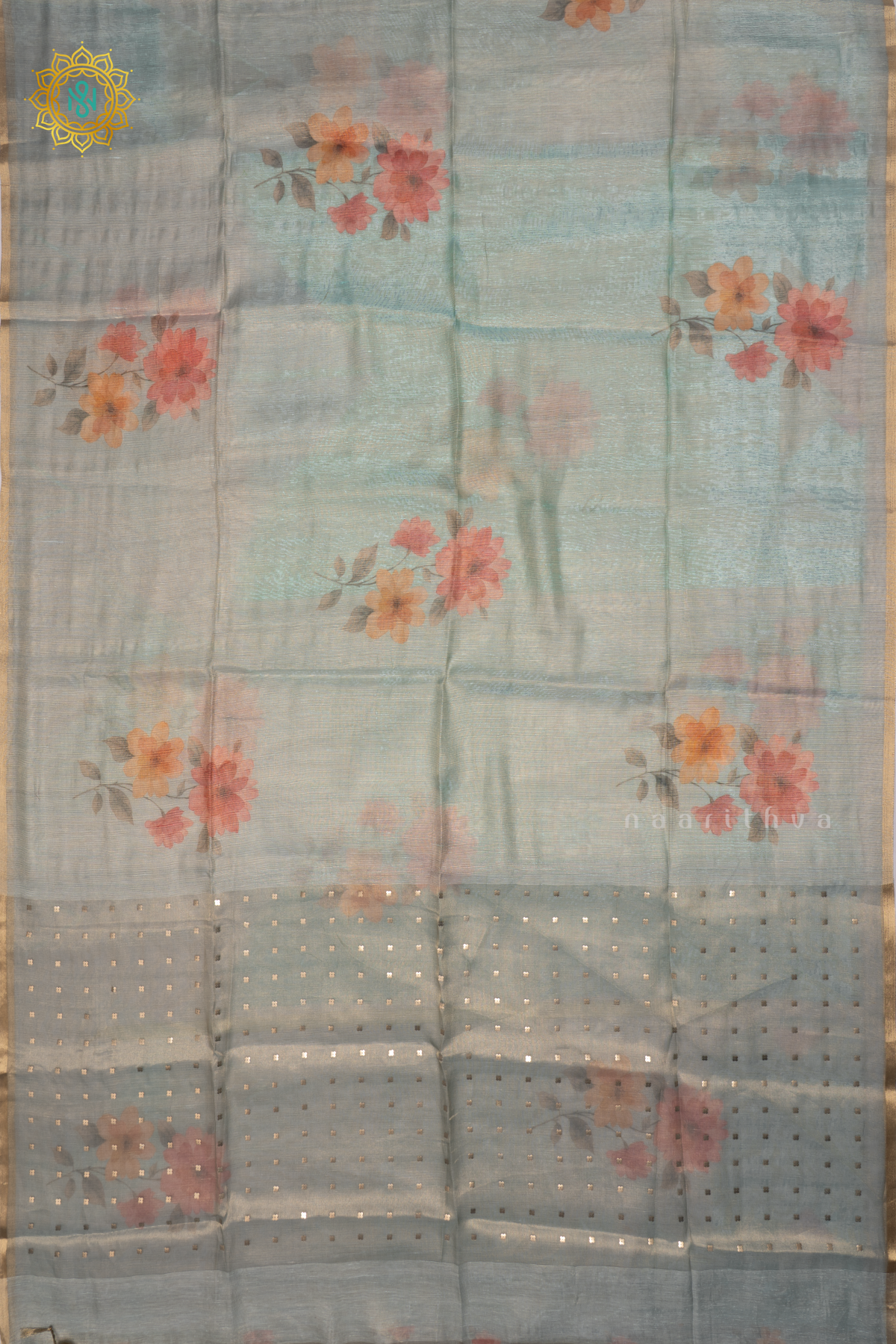 Aqua Blue Linen Tissue Saree With Floral Prints On The Body And Tissue Border