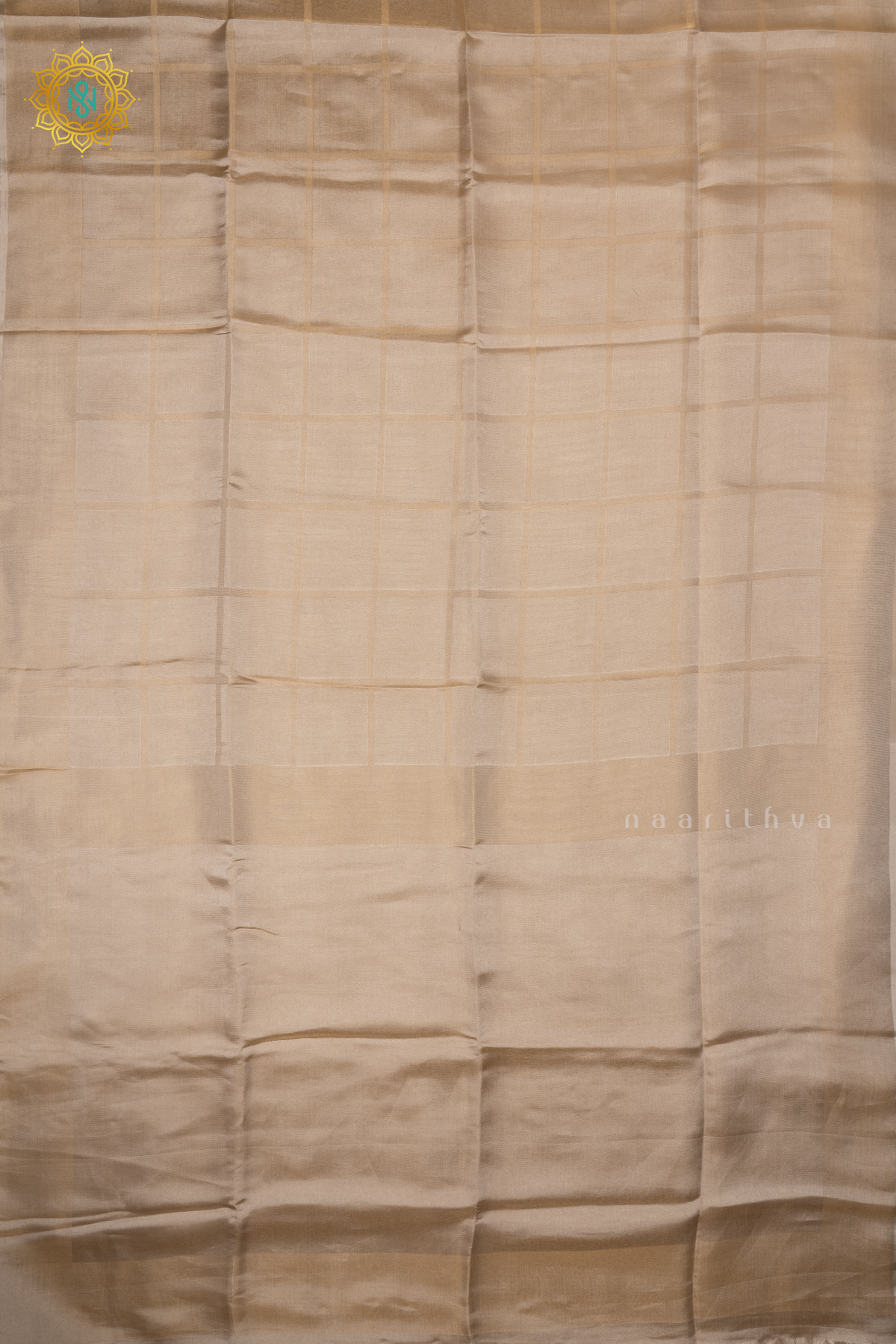 Off White Semi Tissue Saree With Plain Tissue Body And Border