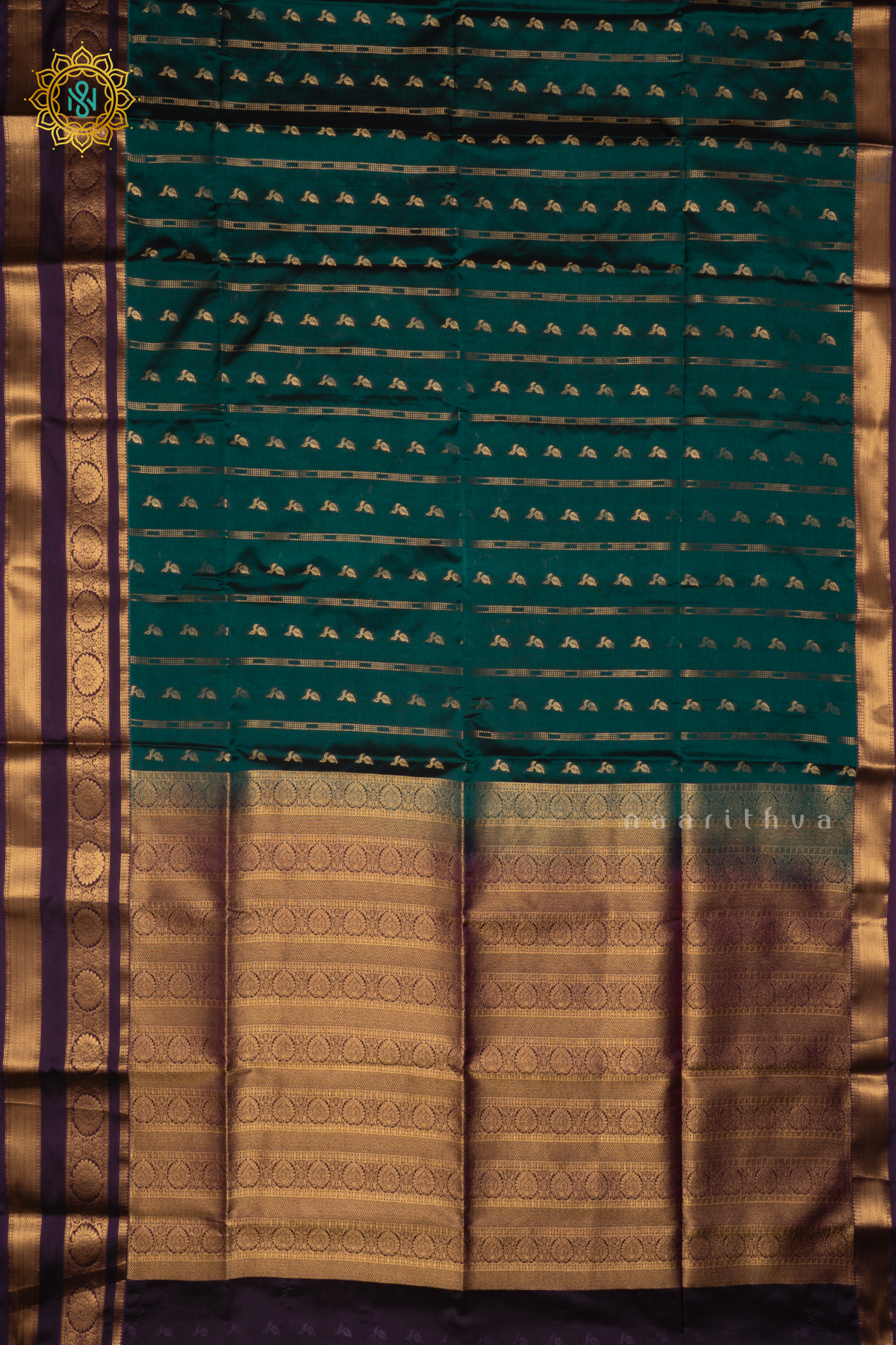 PEACOCK GREEN WITH PURPLE - SEMI KANCHI SAREE ALLOVER ZARI BUTTAS AND CONTRAST GAP BORDER