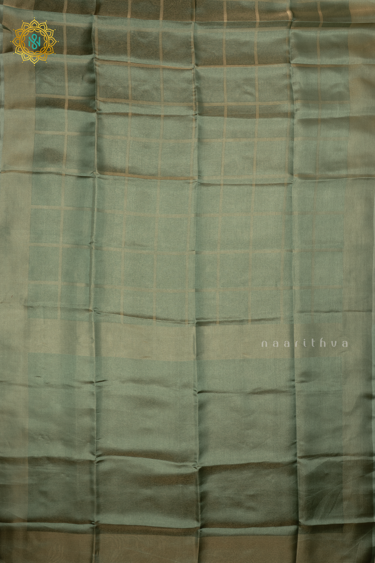 Green Semi Tissue Saree With Plain Tissue Body And Border