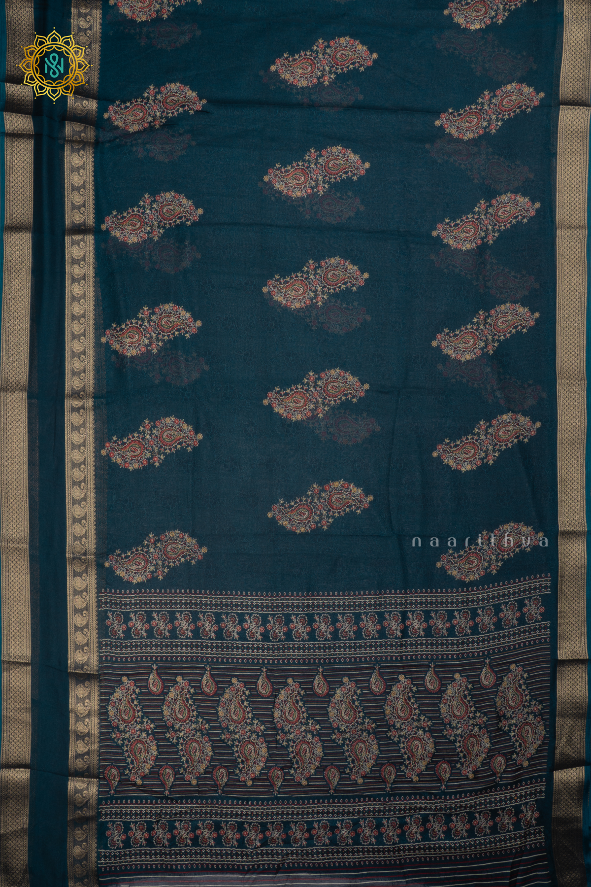 PEACOCK BLUE - SEMI GEORGETTE SAREE WITH PRINTED BODY AND ZARI GAP BORDER