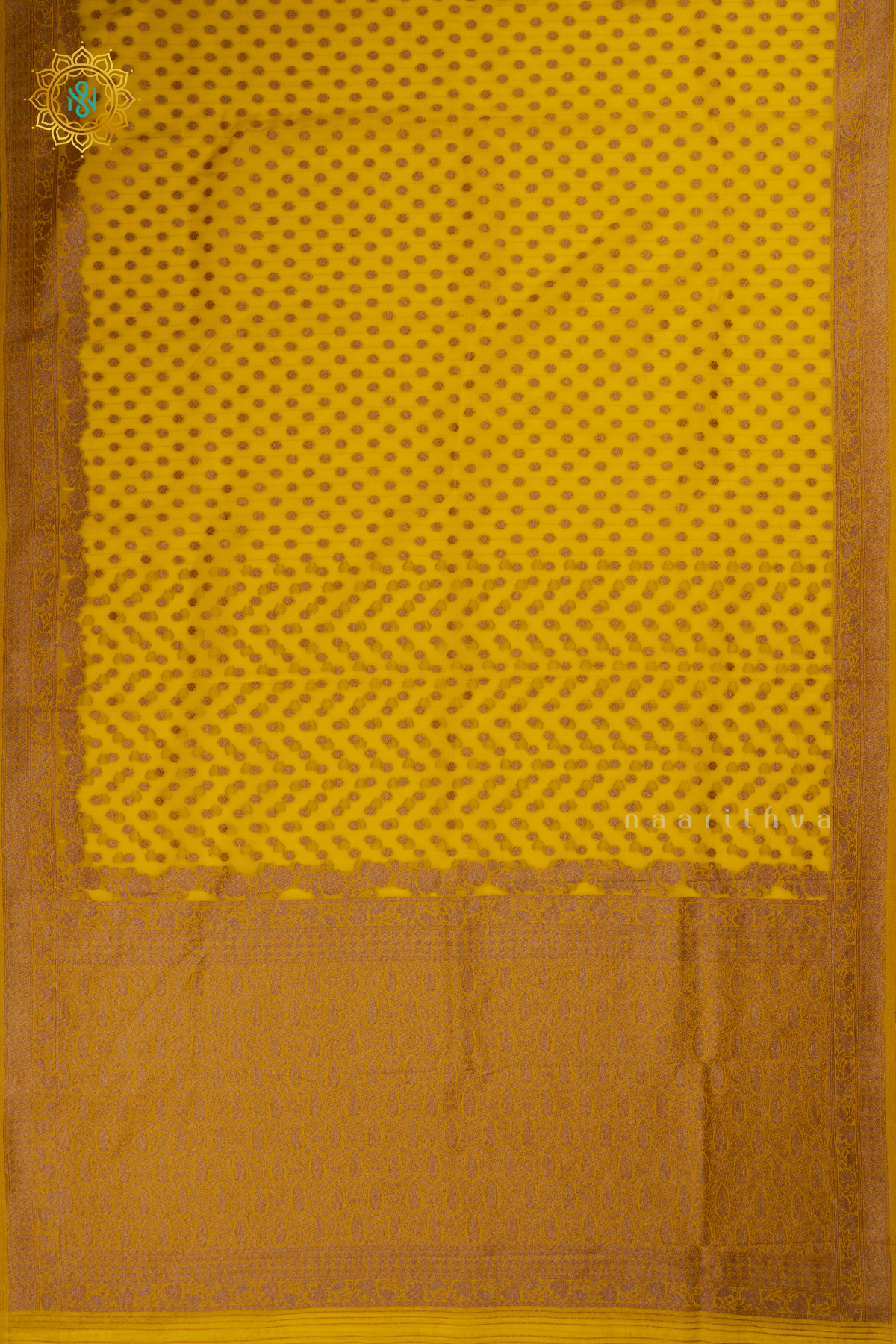 Yellow - Semi georgette saree with allover zari buttas and zari border