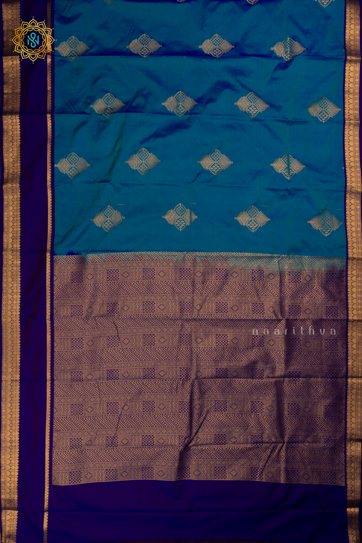 Dual shade of Peacock Blue with Navy Blue Semi Kanchi Saree With Zari Buttas All Over And Contrast Zari Gap Border