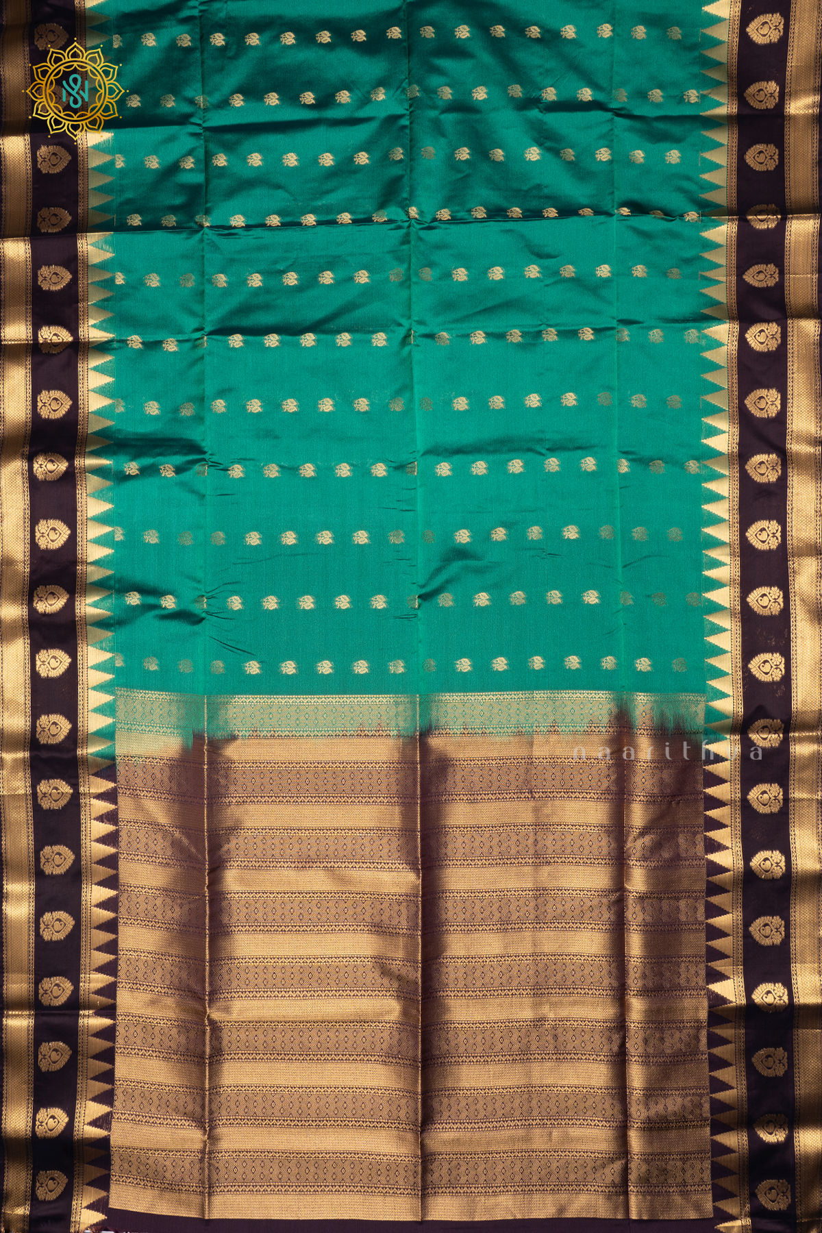 AQUA GREEN WITH DEEP PURPLE - SEMI SOFT SILK SAREE ALLOVER ZARI BUTTAS AND CONTRAST TEMPLE RISING GAP BORDER