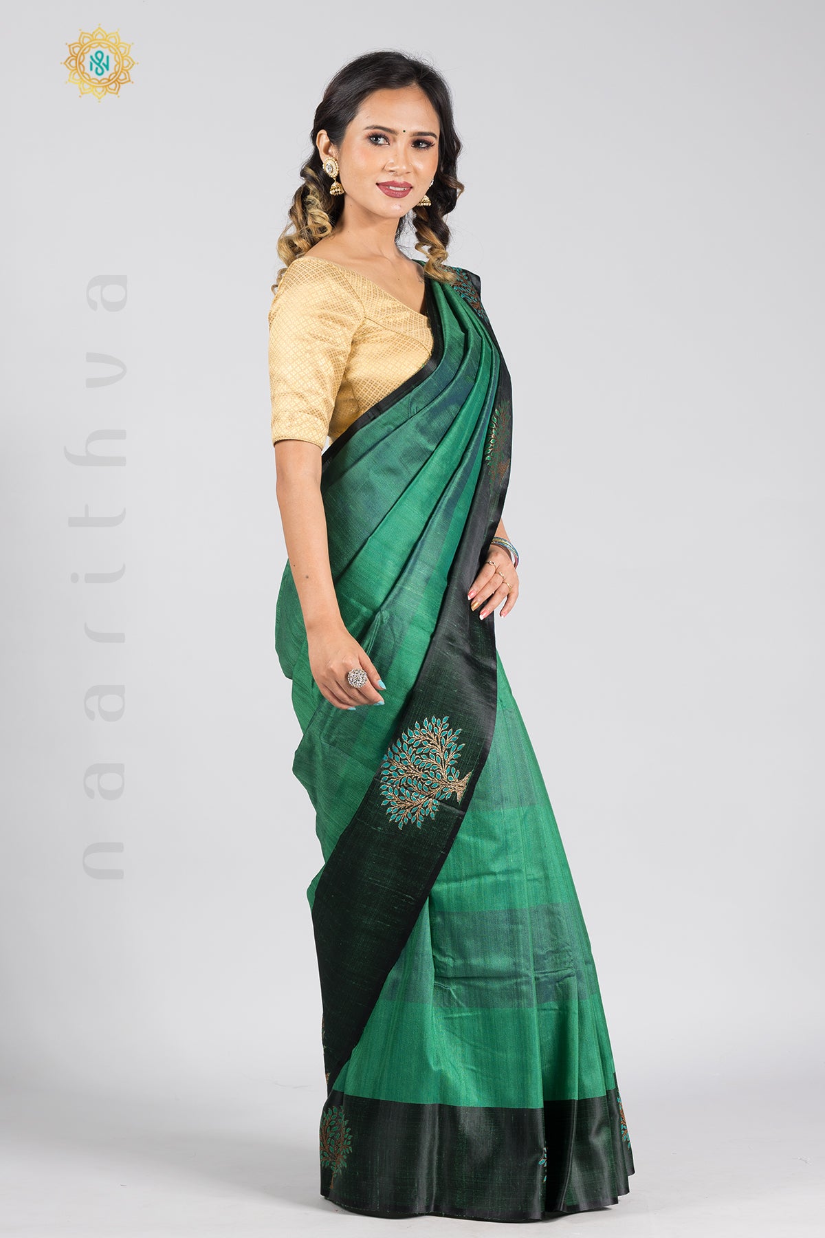 GREEN WITH BLACK - PURE TUSSAR SILK WITH THREAD WOVEN MOTIFS IN SATIN BORDER & ZARI WOVEN PALLU