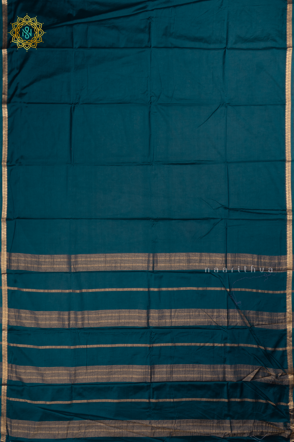 Peacock Blue Semi Mysore Crepe Silk with Plain Body and Zari Border