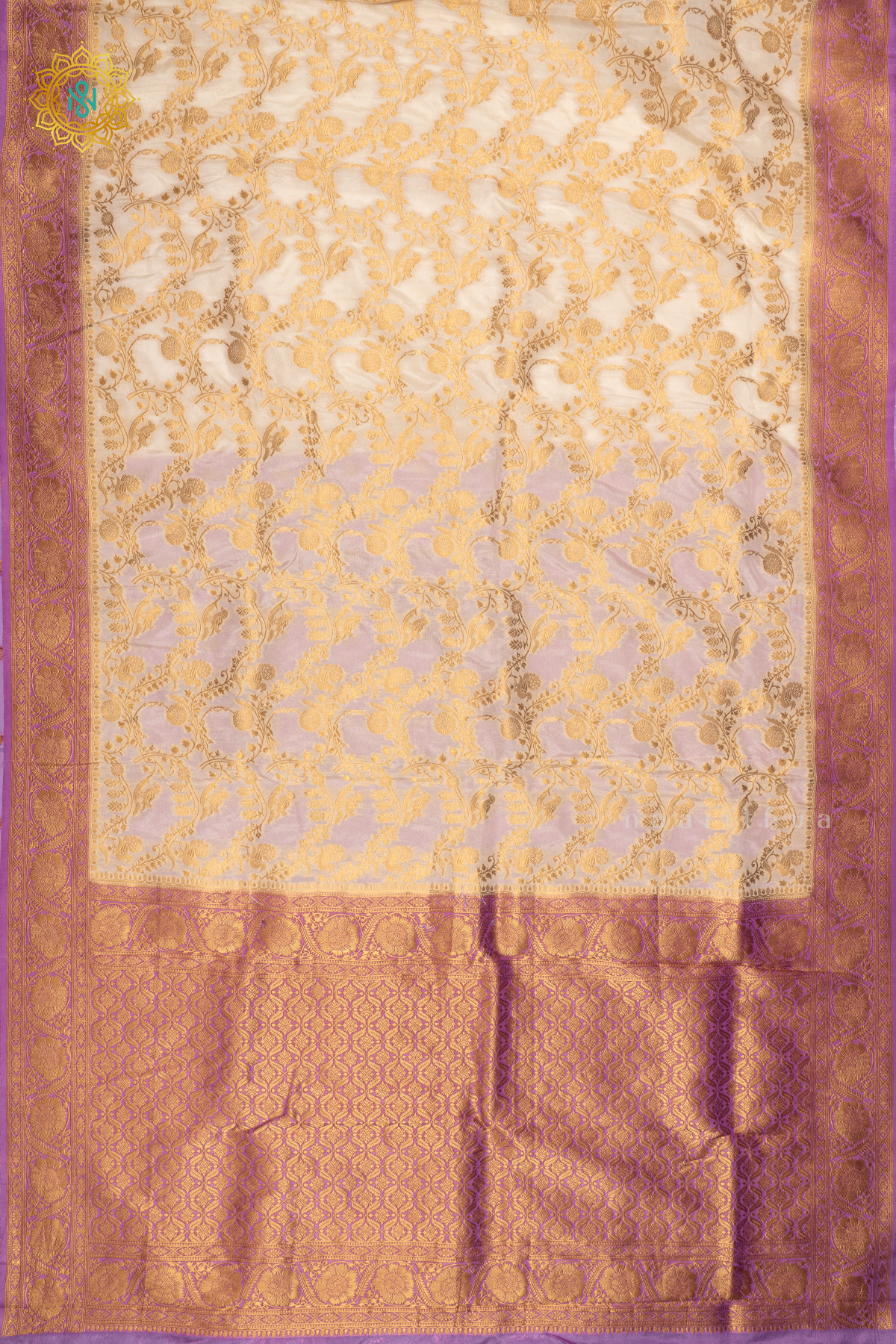 White With Pinkish Lavender Semi Crepe Georgette Saree With Brocade Body And Contrast Zari Border