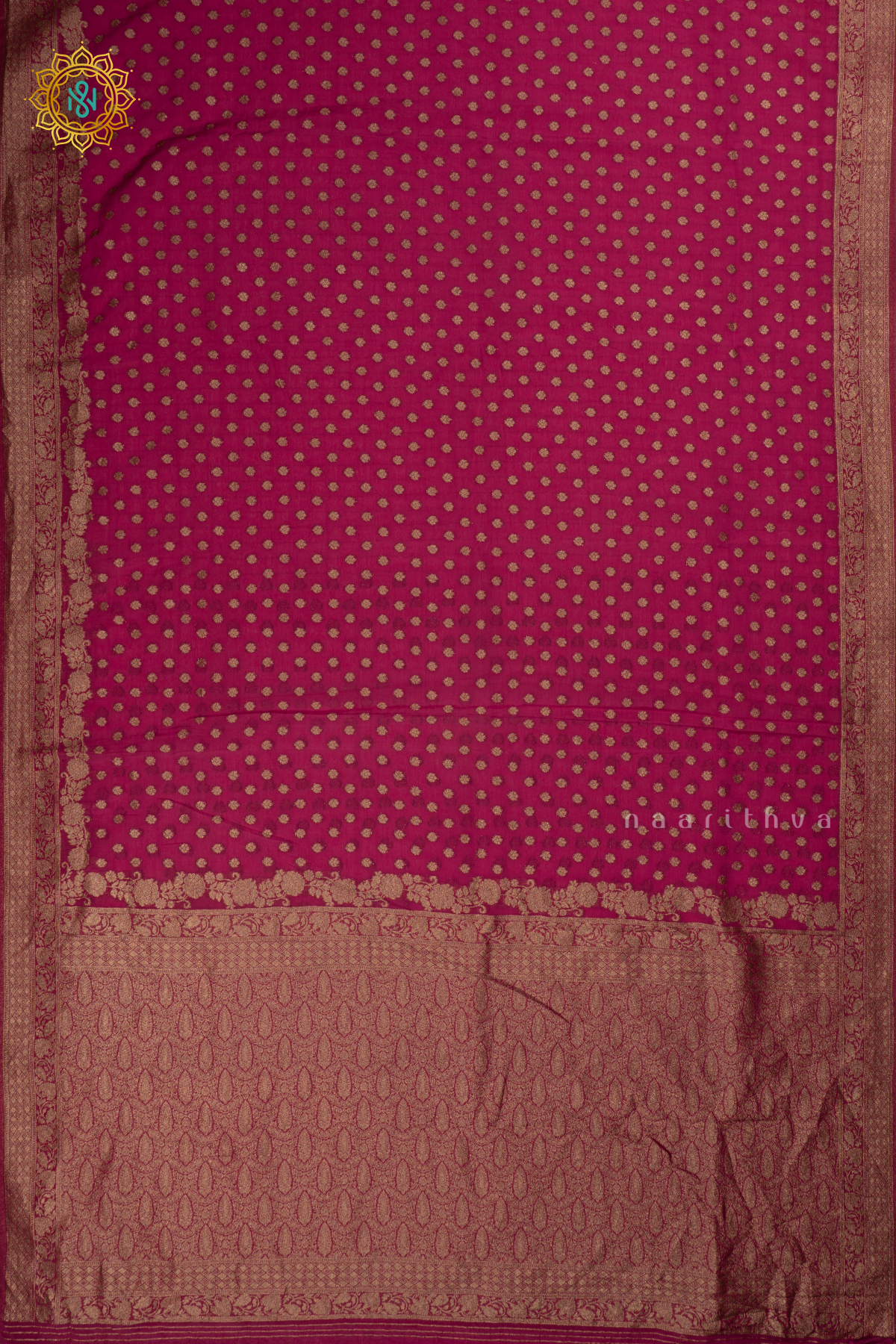 Pink - Semi georgette saree with allover zari buttas and zari border