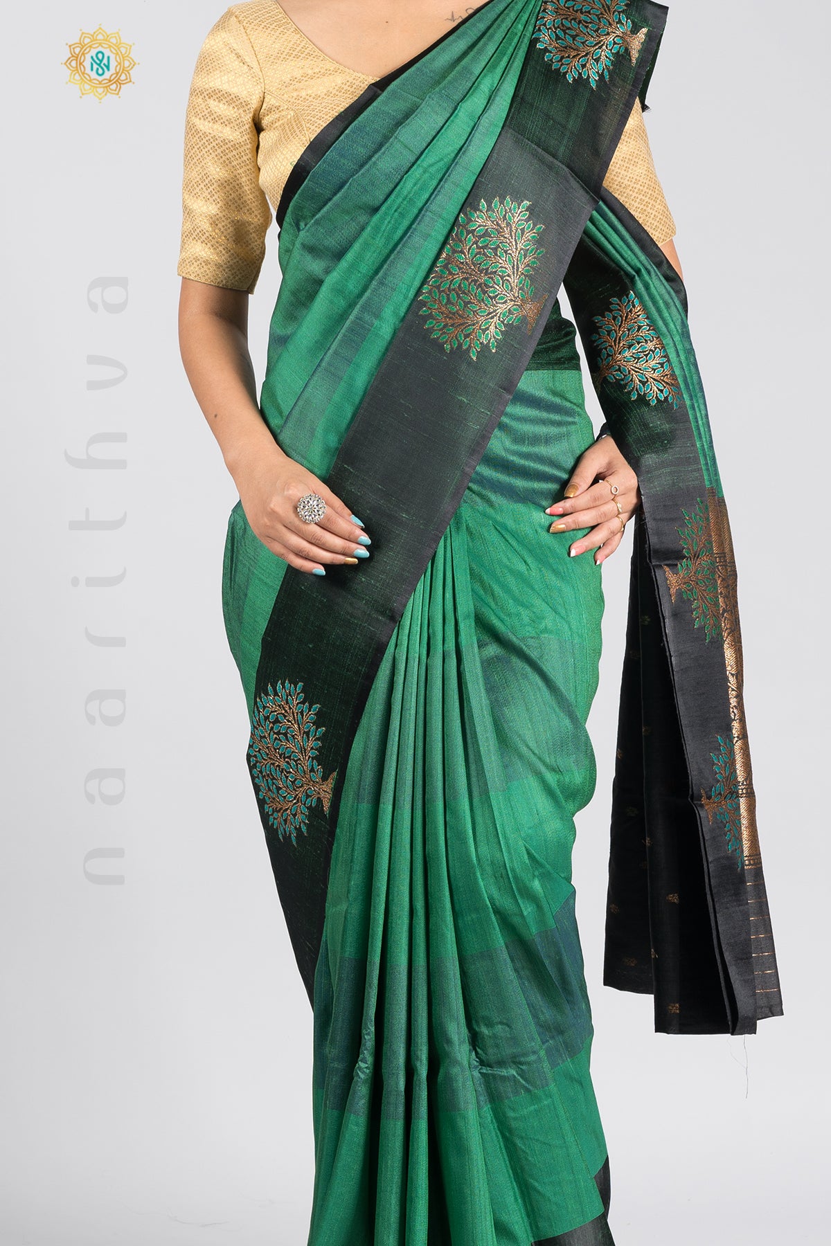 GREEN WITH BLACK - PURE TUSSAR SILK WITH THREAD WOVEN MOTIFS IN SATIN BORDER & ZARI WOVEN PALLU