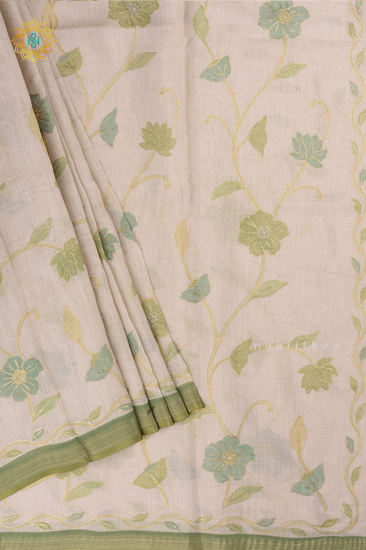 Off White With Green Linen Tissue Saree with Aari Floral Work and Tissue Border