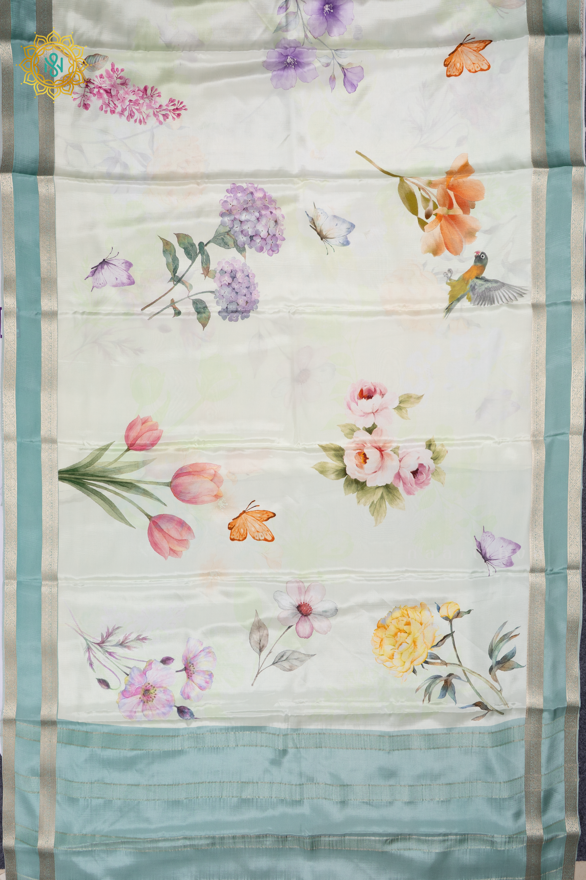 White With Aqua Green Printed Semi Crepe Silk Saree with Contrast Bentex Zari Border