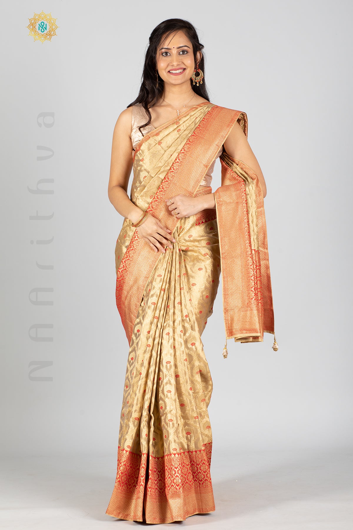 GOLD TISSUE SILK IN MEENA BUTTAS ALLOVER THE BODY WITH ZARI WOVEN PALLU & TISSUE BLOUSE