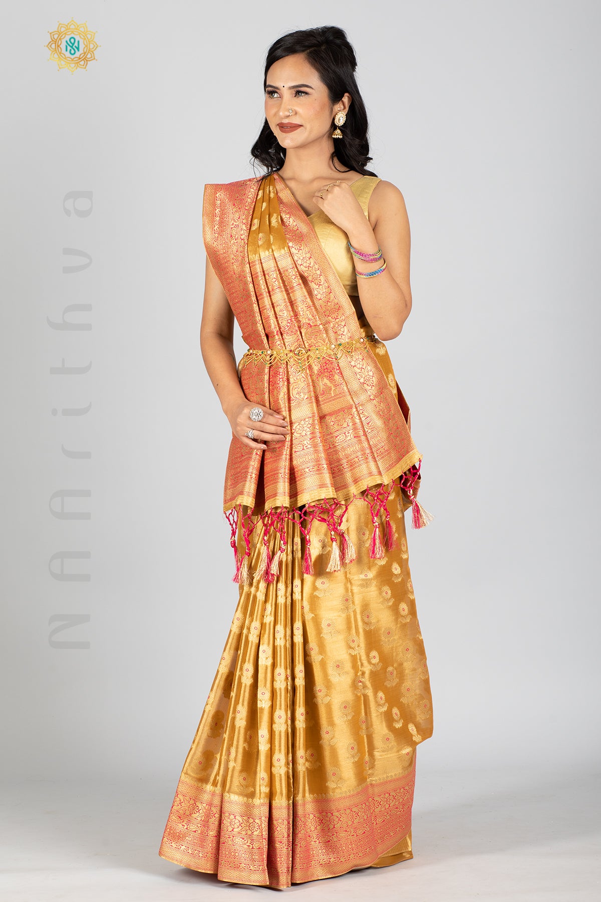 GOLD TISSUE SILK IN MEENA BUTTAS ALLOVER THE BODY WITH ZARI WOVEN PALLU & TISSUE BLOUSE