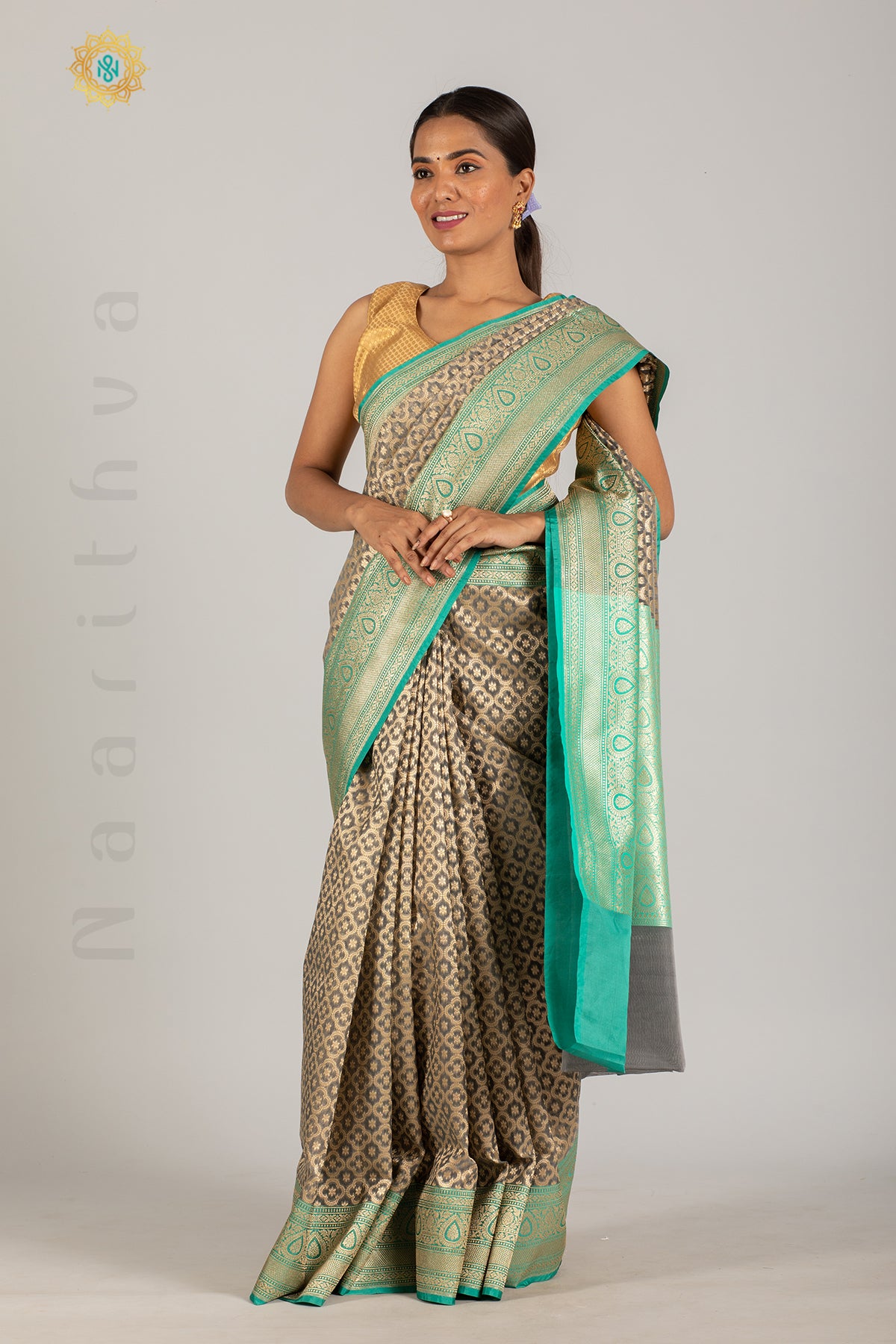 GREY WITH GREEN - KORA ORGANZA WITH ZARI WEAVES ON THE BODY & CONTRAST BORDER