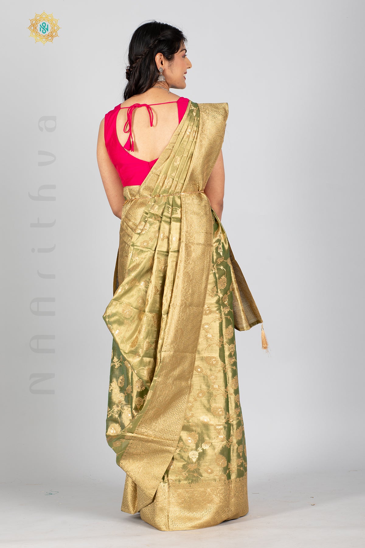 GREEN TISSUE SILK IN BROCADE WEAVES ALLOVER THE BODY WITH ZARI WOVEN PALLU & TISSUE BLOUSE