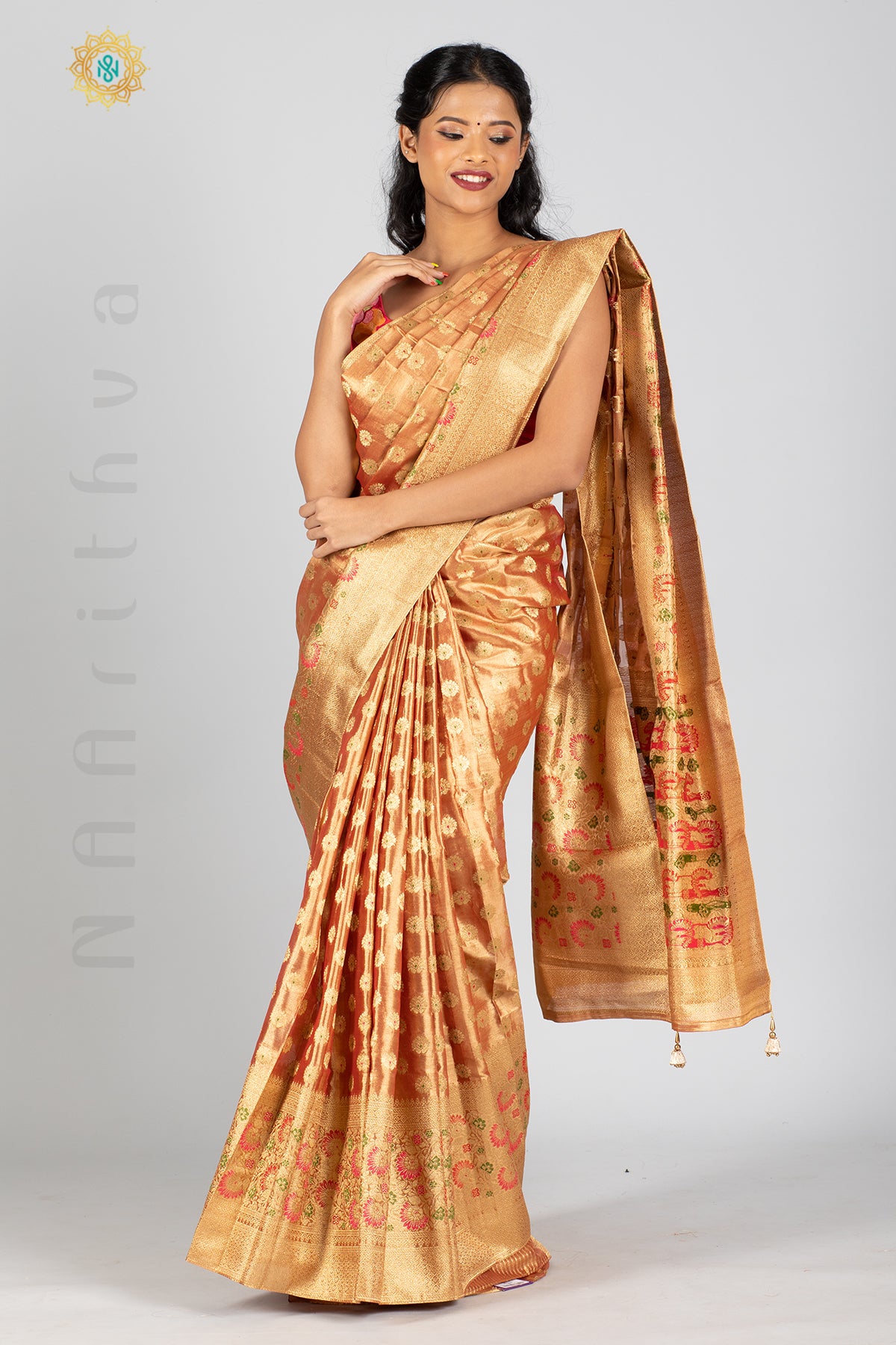 ROSE GOLD TISSUE SILK IN MEENA BUTTAS ALLOVER THE BODY WITH ZARI WOVEN PALLU & TISSUE BLOUSE