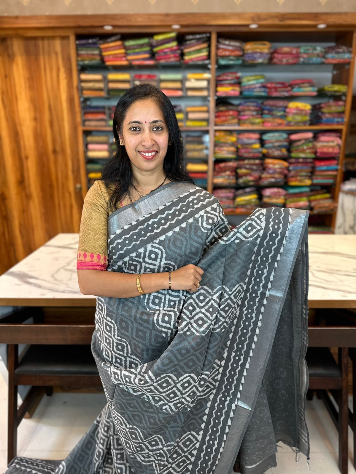 Grey batik-style printed mul-mul cotton saree, contrast border & pallu  printed with unique designs